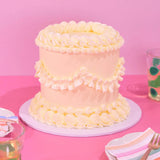 Vintage Cake - Single Colour with hand-piped Swiss Meringue icing, 6 layers, tall and elegant by Crumbs & Doilies.